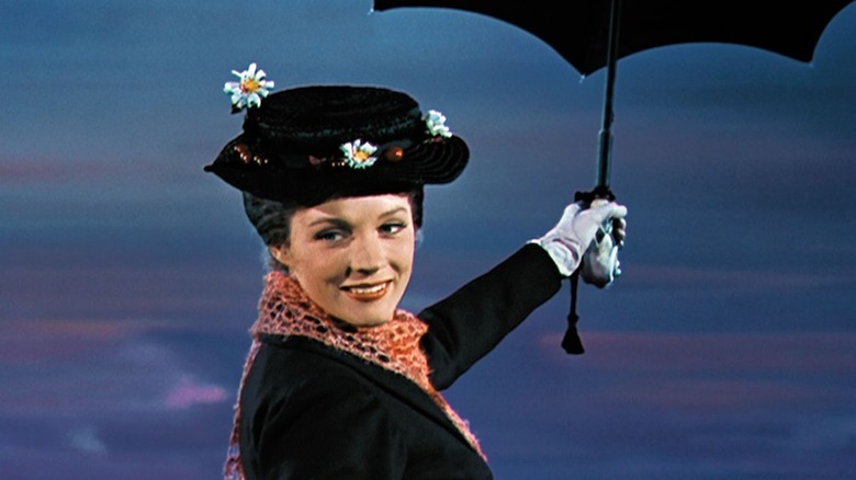 Mary Poppins holding an umbrella