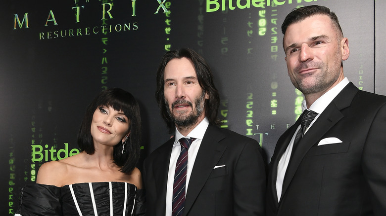 Ellen Hollman, Keanu Reeves, and Stephen Dunlevy at Matrix premiere