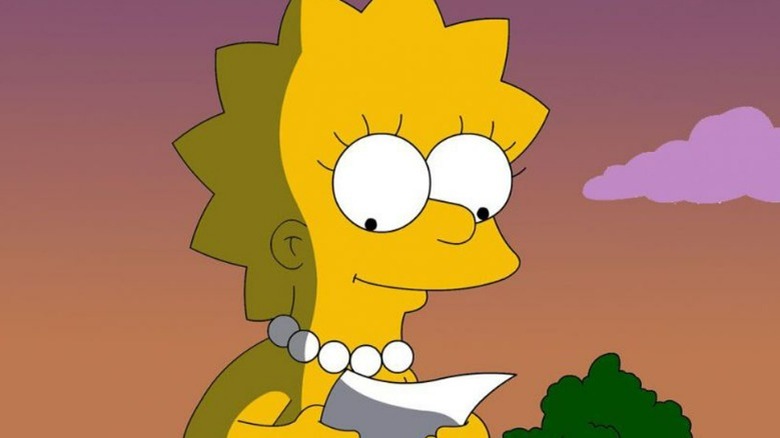 Lisa Simpson looking at a piece of paper