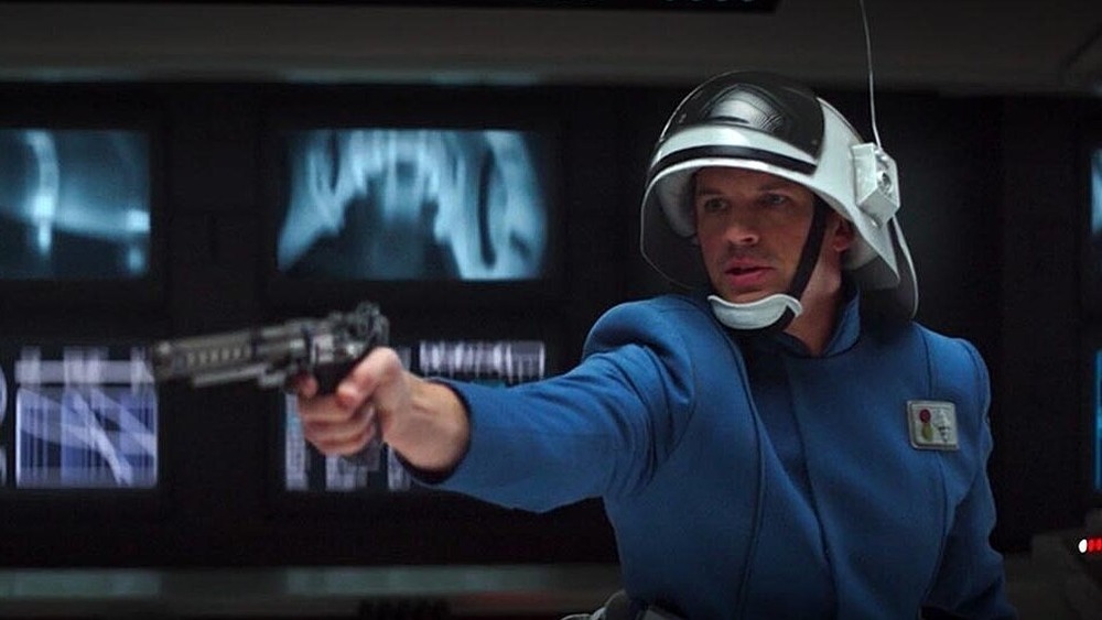 Matt Lanter as New Republic Soldier brandishing a gun