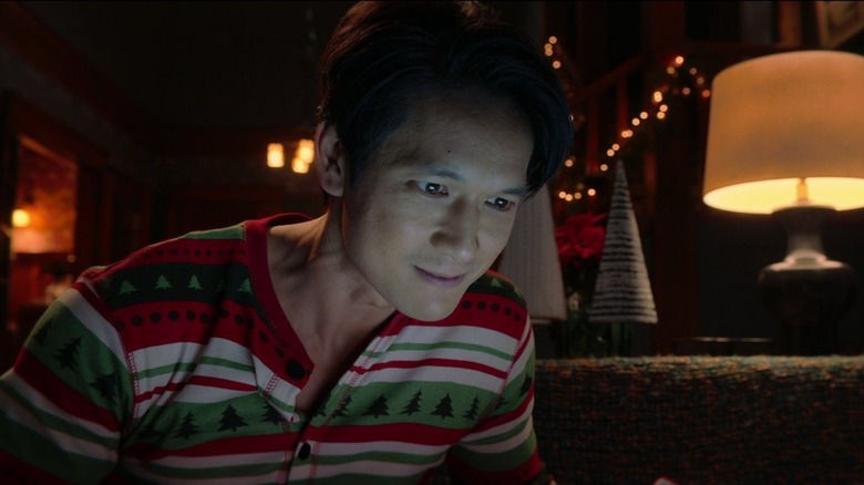 Harry Shum Jr. in ugly sweater in Love Hard