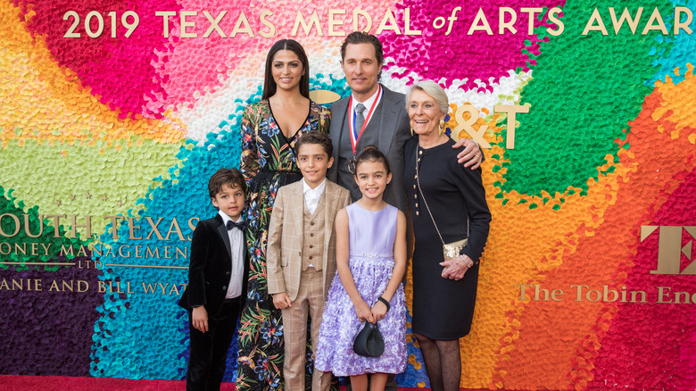 Matthew McConaughey posing with his family