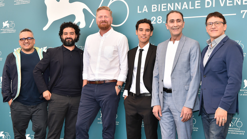 Producers Joe Russo, Mohamed Al Daradji, director Matthew Michael Carnahan, Adam Bessa, Suhail Dabbach and producer Anthony Russo attend Mosul photo call during the 76th Venice Film Festival