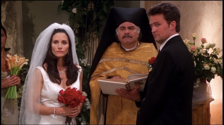 Monica, Chandler, and a priest in Friends