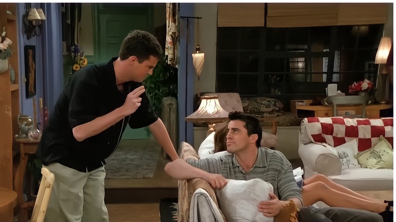 Chandler and Joey in living room.