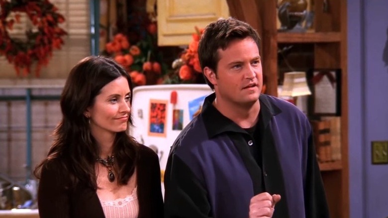 Chandler and Monica in kitchen