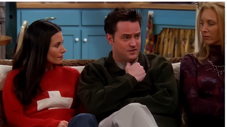 Monica, Chandler, and Phoebe sitting