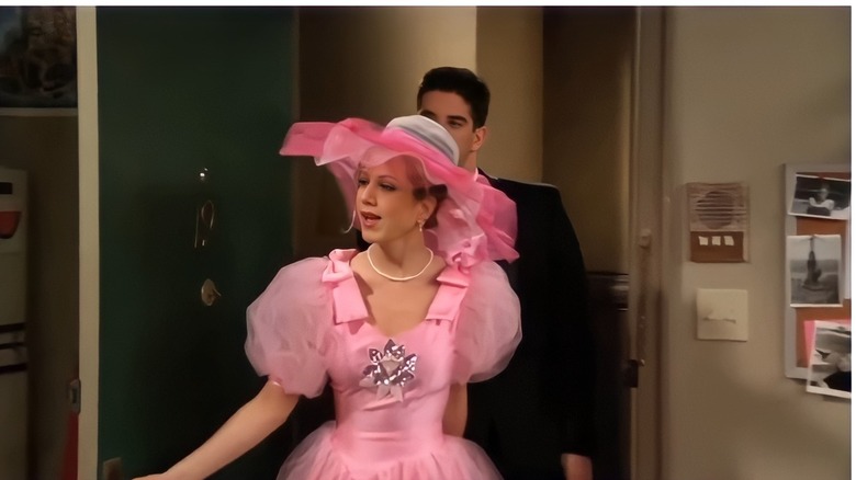 Rachel wears pink dress