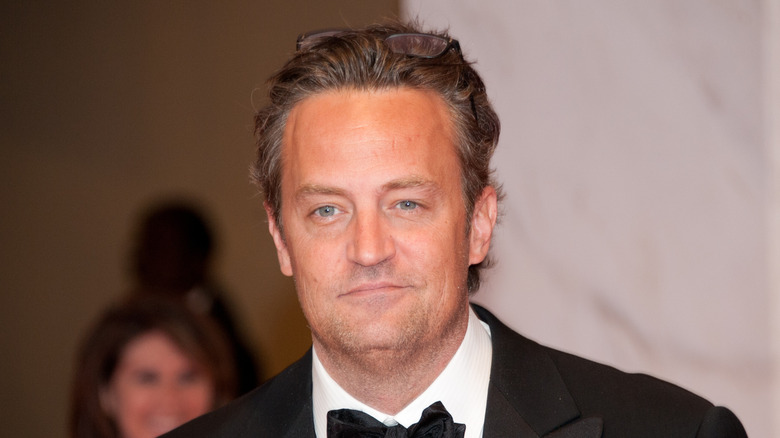 Matthew Perry wearing a tuxedo