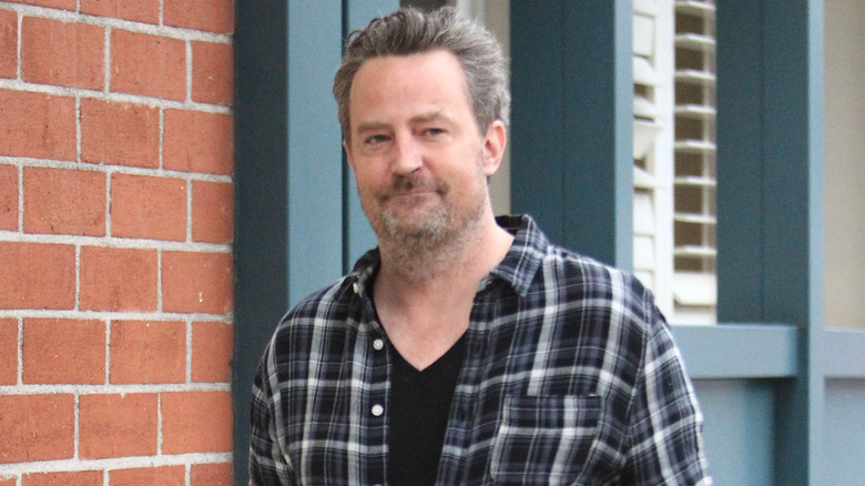 Matthew Perry in check shirt