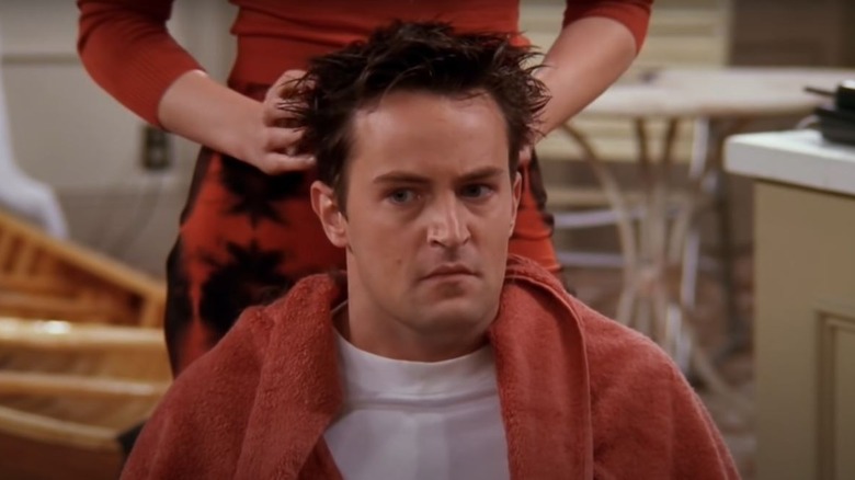 Chandler Bing getting haircut