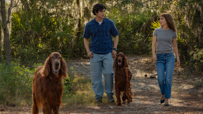 Joe and Elizabeth walking dogs