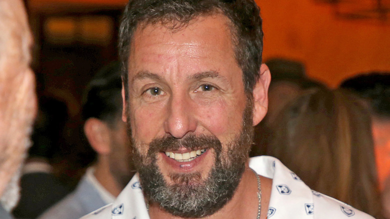 Adam Sandler grinning