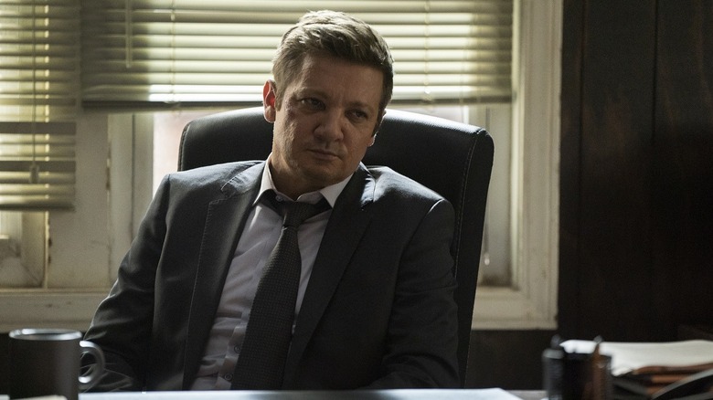 Jeremy Renner glaring