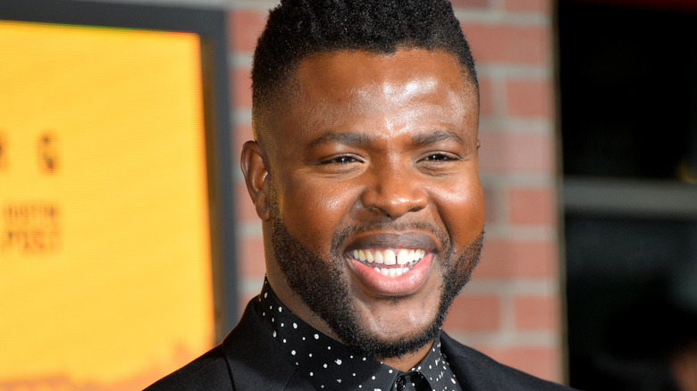 Winston Duke grinning