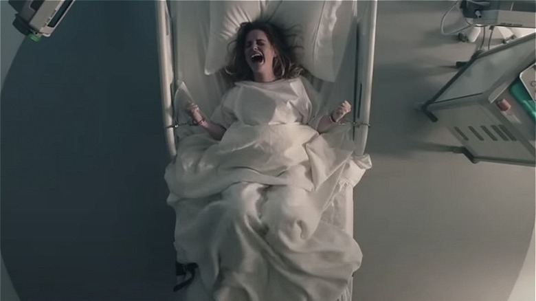 Esther screaming in hospital bed