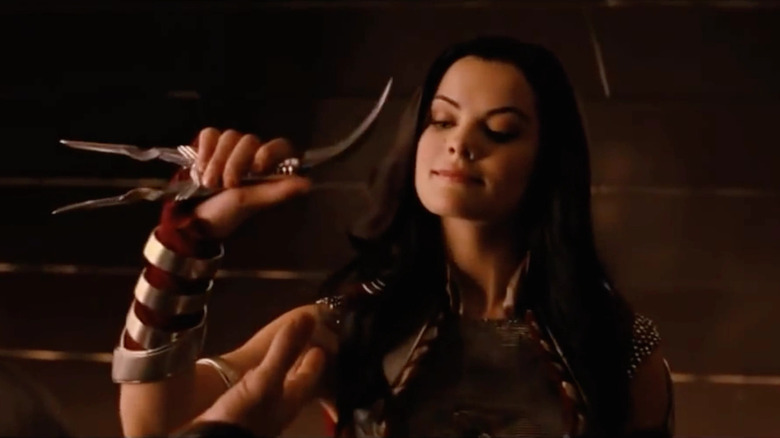 Sif holds Loki's daggers