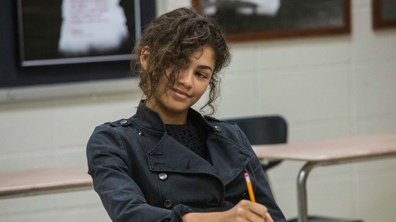 MJ grinning in classroom