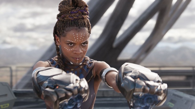 Shuri pointing weapons