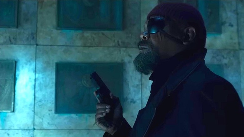 Nick Fury holding gun