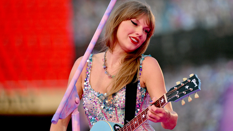 Taylor Swift playing guitar