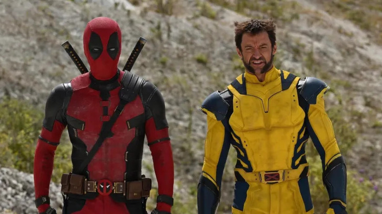 Deadpool and Wolverine in their costumes