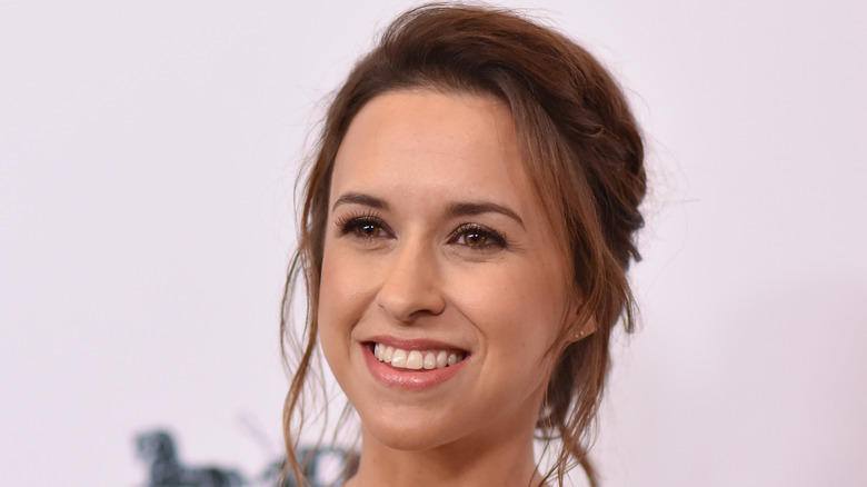 Lacey Chabert at event smiling