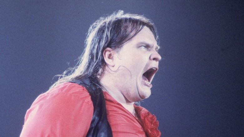 Meat Loaf singing into mic