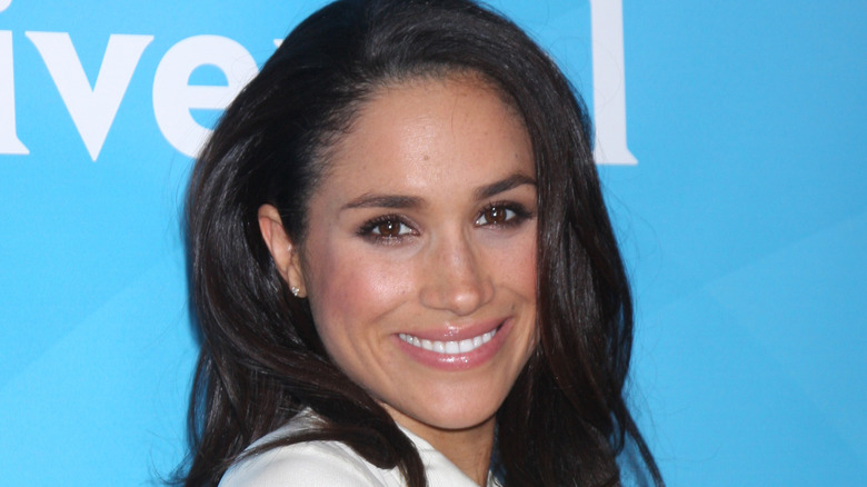 Meghan Markle at event smiling