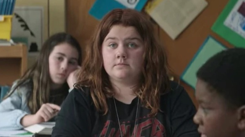 Young Lydia sitting at desk