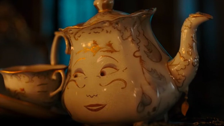 Mrs. Potts talks to a sleepy-looking Chip