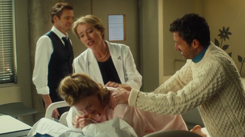 Dr. Rawlings attempts to comfort Bridget Jones, who is in on her elbows in a hospital bed