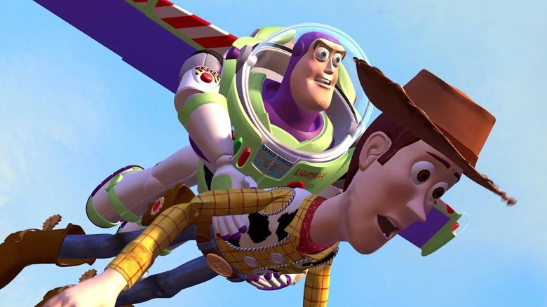 Buzz Lightyear flies with Woody