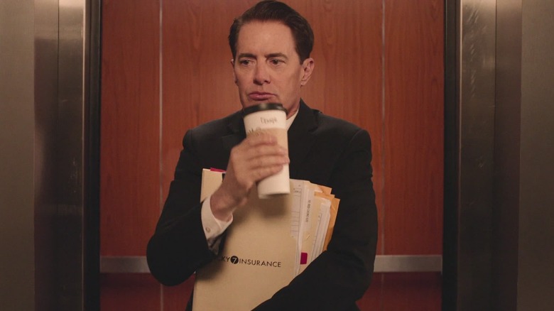 Dale Cooper holds coffee