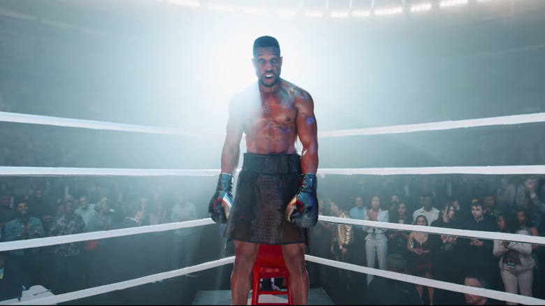 Anderson Dame stands up in the ring against Adonis Creed