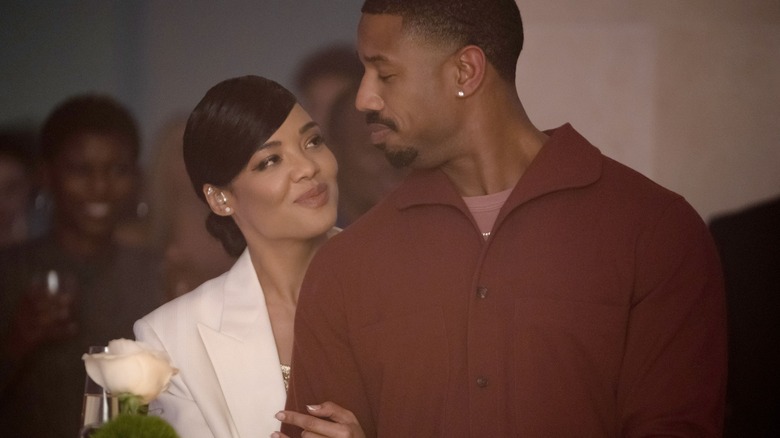 Bianca and Adonis Creed look at each other