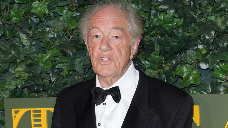 Michael Gambon in tuxedo talking