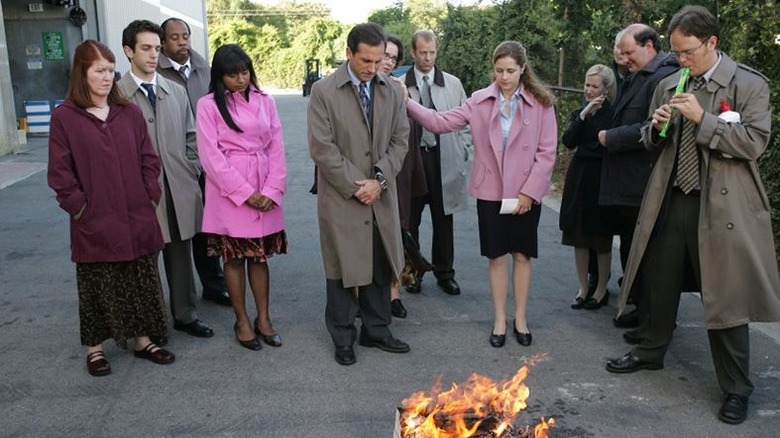 Michael holds a bird funeral