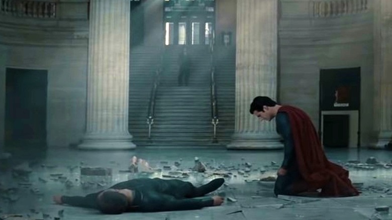 Superman kneeling beside Zod's body