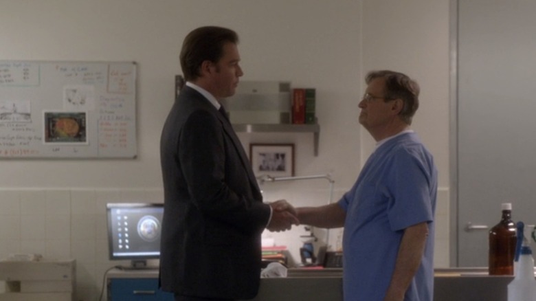 DiNozzo shaking Ducky's hand