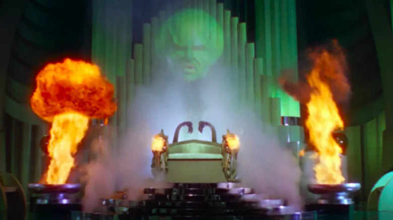 The Wizard of Oz, as a giant projection flanked by fire