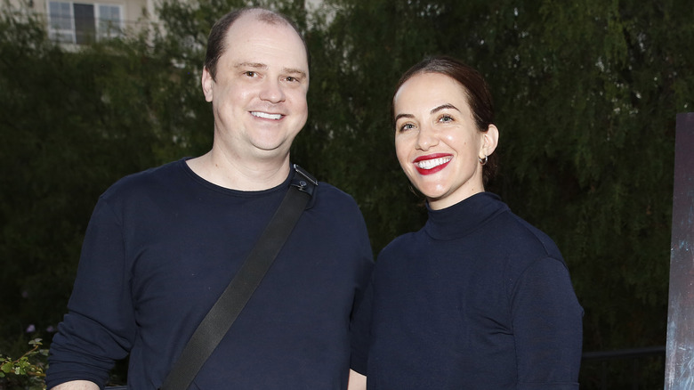 Mike Flanagan and Kate Siegel look at camera