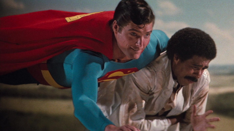 Superman carrying Gus Gorman in Superman 3