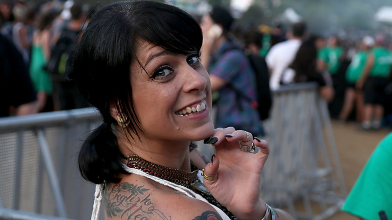 Danielle Colby smiling at concert