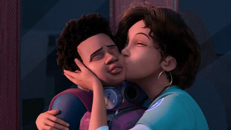 Rio Morales kissing Miles on the cheek