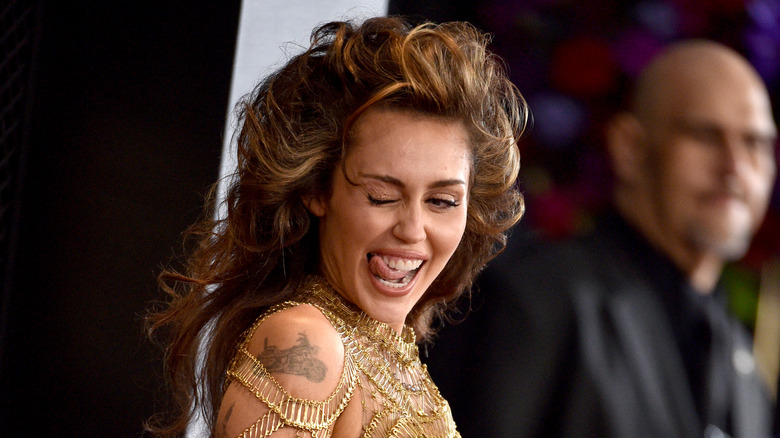 Miley Cyrus winking tongue out