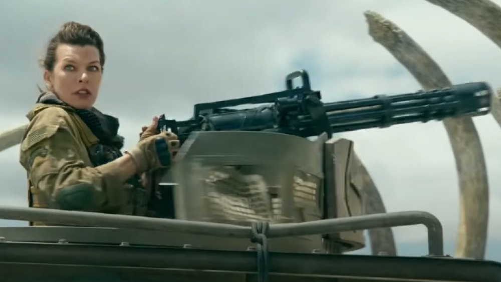 Milla Jovovich with mounted gun