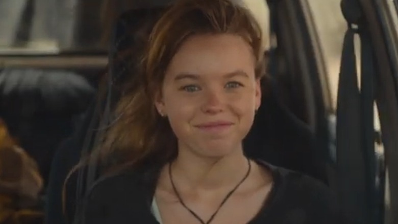 Meg smiling in car