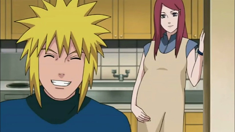 Minato smiling with Kushina standing behind