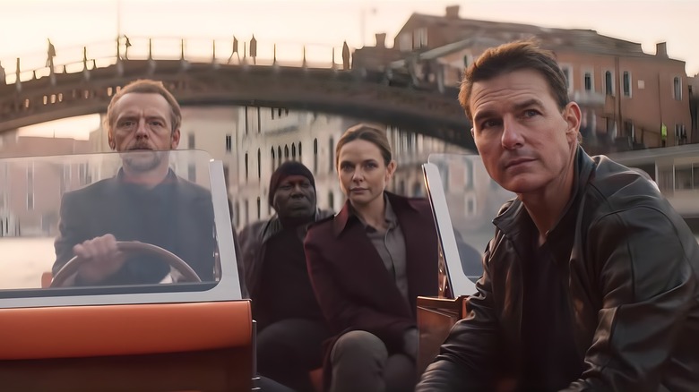 Benji, Luther, Ilsa, and Ethan on boat in Venice